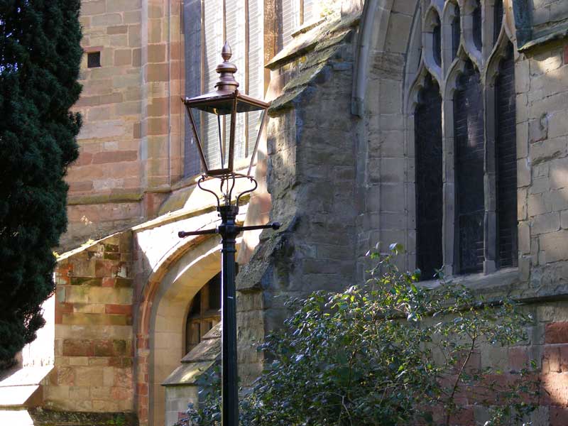 gas lamp at east end of Priory church